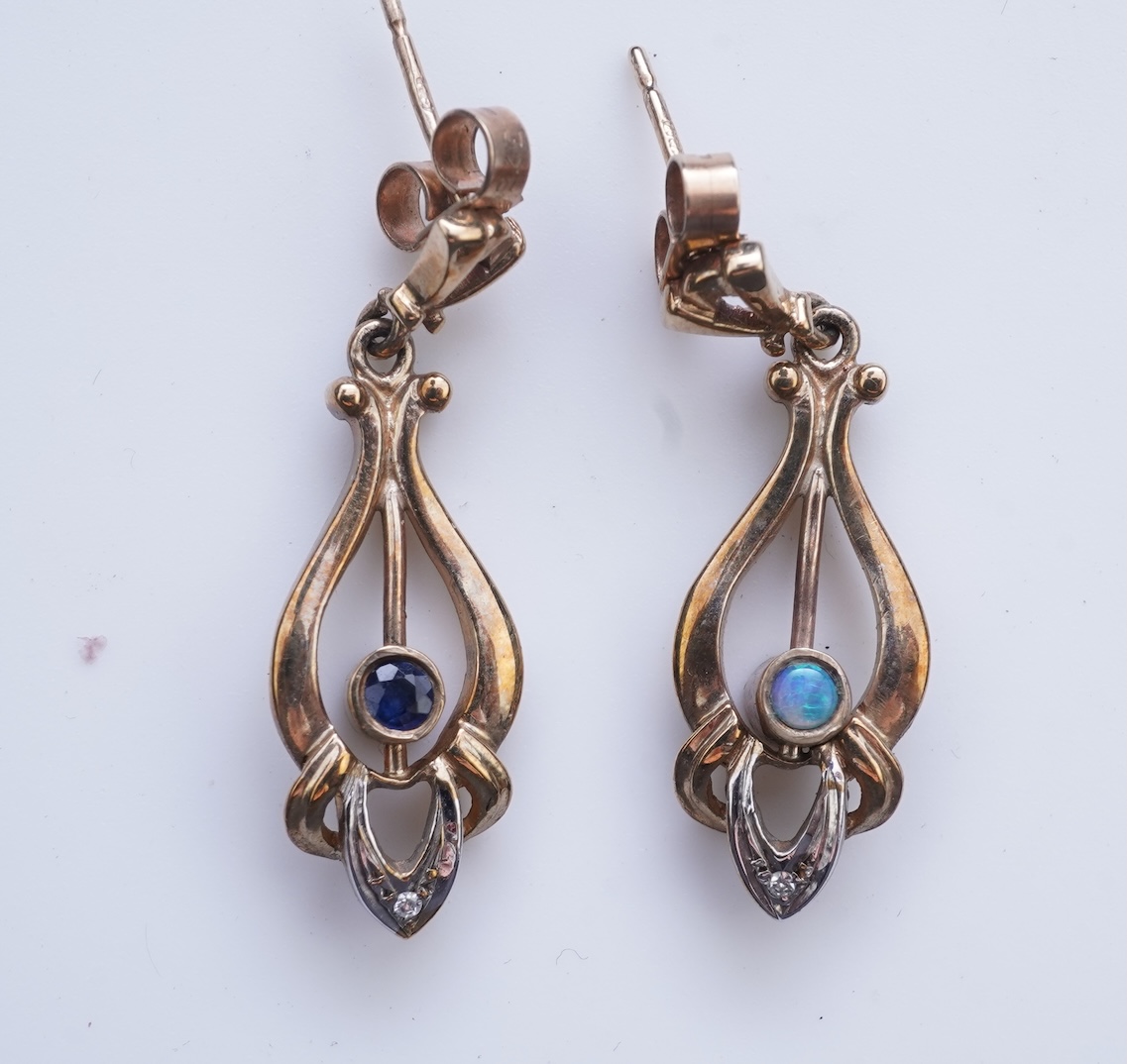 Eight pairs of earrings and pendant, comprising: a pair of onyx studs; a pair of emerald studs; a pair of sapphire and diamond drop earrings; a pair of opal drop earrings; a pair of garnet drop earrings; and a shell pend